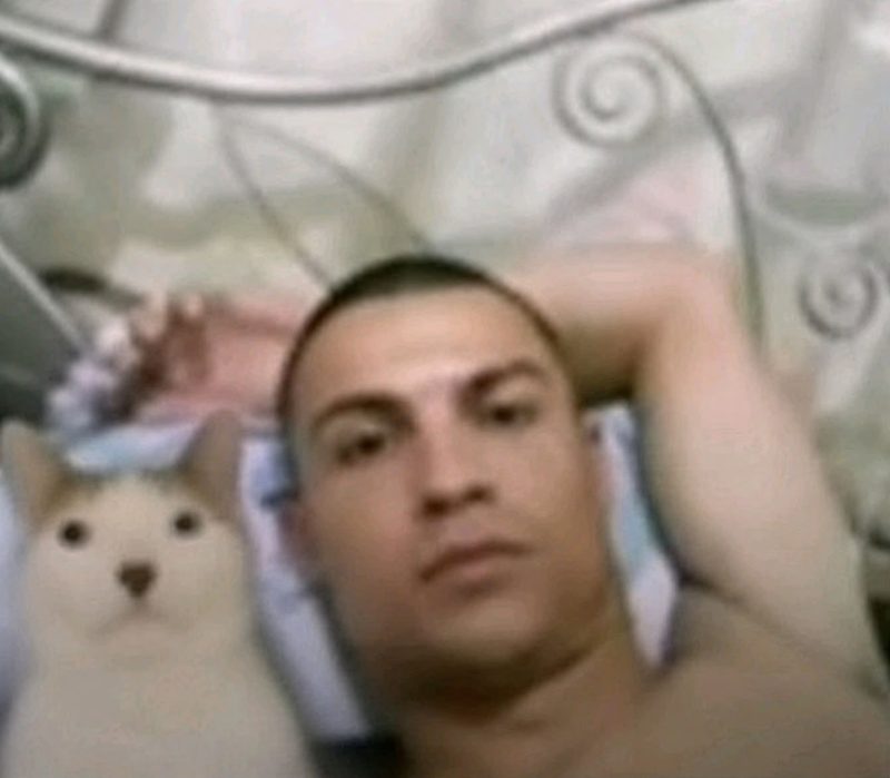 CET lying in bed next to a man